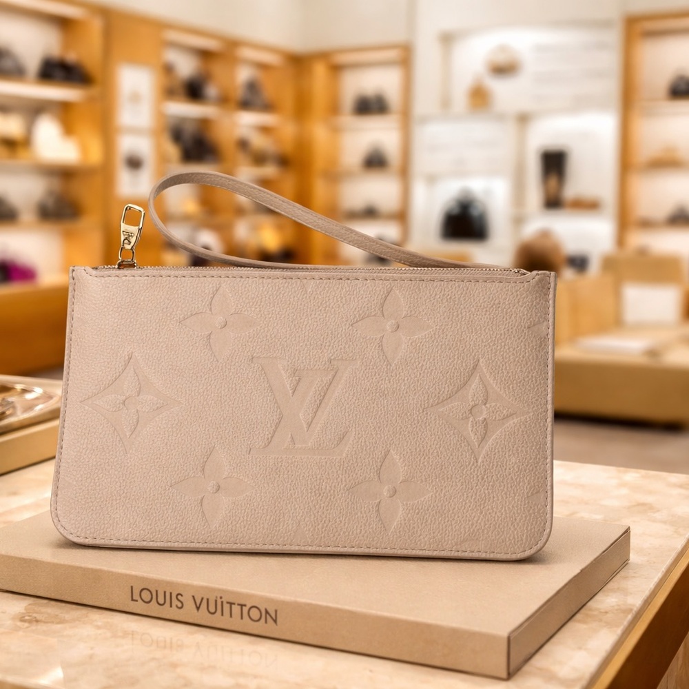 New Louis Vuitton embossed Monogram Empreinte leather Sand POCHETTE Pouch